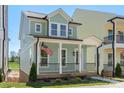 Charming two-story home with a welcoming front porch and beautiful curb appeal at 5820 Pittmon Ln, Kannapolis, NC 28081
