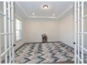 Bright office space with tray ceilings and large windows at 809 Brown Creek Dr, Matthews, NC 28104