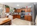 This spacious kitchen features ample counter space, modern appliances, and stylish cabinets for all your culinary needs at 9718 Eagle Feathers Dr, Charlotte, NC 28214