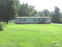 Well maintained single story home featuring a large lawn and traditional facade at 3942 Benny Shrum Ln, Maiden, NC 28650