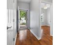 Bright foyer featuring hardwood floors and views to the outside, showcasing the home's entrance at 5076 Newport Lakes Dr, Rock Hill, SC 29732