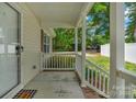 Inviting front porch showcasing brick accents and a welcoming entrance at 772 Austin Rd, New London, NC 28127