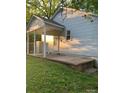 A partially covered backyard patio extends usable square footage at 104 Willetta Dr, Charlotte, NC 28217