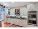 Well-equipped kitchen featuring stainless steel appliances, granite countertops, and ample cabinetry at 1337 Braeburn Nw Rd, Concord, NC 28027