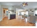 Spacious living room featuring hardwood floors, fireplace, and ample natural light at 2915 Cherry Blossom Ct, Fort Mill, SC 29715