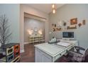 Bright office with stylish decor, modern desk, and ample workspace at 464 Granite Lake Ct, Denver, NC 28037