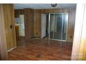 Living room features wood-look floors and sliding glass doors to another room at 3225 Sawmill Rd, Hickory Grove, SC 29717