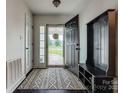Inviting foyer with tile floor and a hall tree, showcasing the home's entry at 1140 Landsdown Dr, Salisbury, NC 28147