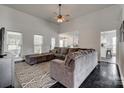 Spacious living room featuring a large sectional sofa and stylish accents at 1140 Landsdown Dr, Salisbury, NC 28147