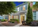 Traditional brick facade complemented by blue shutters and mature landscaping at 17916 Ragtop Day Ln, Cornelius, NC 28031