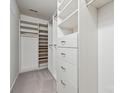 Spacious walk-in closet with ample shelving and hanging space for organized storage at 17916 Ragtop Day Ln, Cornelius, NC 28031