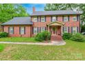 Attractive brick home with a covered front entry and well-kept landscaping, creating an inviting curb appeal at 2330 Raven Dr, Rock Hill, SC 29732