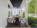Inviting front porch featuring comfortable seating, stylish decor, and a relaxing atmosphere at 330 Horton Grove Rd, Fort Mill, SC 29715