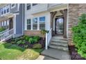 Inviting townhome exterior with well-manicured landscaping and a welcoming entrance at 110 Synandra Dr # B, Mooresville, NC 28117