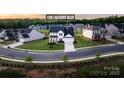 Beautiful aerial view of home showcasing its location and neighborhood amenities and verdant landscaping at 1381 Regions Blvd, Fort Mill, SC 29707