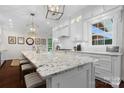 Bright kitchen with granite counters, large island, and stainless steel appliances at 15247 Prescott Hill Ave, Charlotte, NC 28277