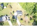 A nice aerial view of the property showing the landscaping and driveway at 3555 Tree Line Dr, Rock Hill, SC 29732
