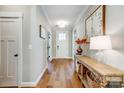 Bright entryway features hardwood floors, neutral walls, and stylish decorative accents at 4116 Spring Cove Way, Belmont, NC 28012