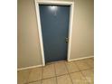 Unit door, featuring a neutral color and simple design, offering a private entrance at 415 Orchard Trace Ln # 1, Charlotte, NC 28213