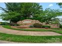 Stone community sign, Hampton Ridge, surrounded by manicured landscaping at 10434 Blackstock Rd, Huntersville, NC 28078