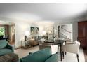 Open-concept living room features neutral paint, hardwood floors, fireplace and seamless flow to dining area at 2000 Ferncliff Rd, Charlotte, NC 28211