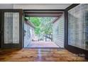 Spacious entryway featuring double doors opening to brick patio at 46 Timberidge Dr, Lake Wylie, SC 29710