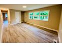 Spacious living room featuring hardwood floors and large windows at 509 North St, Belmont, NC 28012