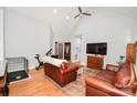 Spacious living room featuring hardwood floors, neutral paint, and ample natural light at 7328 S Providence Rd, Waxhaw, NC 28173