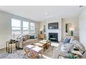Bright living room features a fireplace, comfortable seating, and lots of natural light at 2636 Tillman St, Monroe, NC 28112