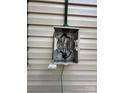 Exterior electrical box with exposed wiring at 407 Lincoln St, Wadesboro, NC 28170