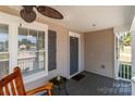 Cozy front porch featuring a comfortable chair and a charming view, perfect for relaxing outdoors at 975 Mt Moriah Church Rd, China Grove, NC 28023