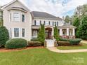Charming two-story home with landscaped front yard and inviting entryway at 123 Yellow Jacket Cir, Mooresville, NC 28117