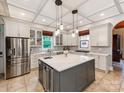 Bright, newly renovated kitchen with large island, modern appliances, and a neutral color palette at 123 Yellow Jacket Cir, Mooresville, NC 28117