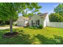 Inviting front lawn and garden enhance this home's curb appeal under a bright sky at 1961 Leesburg Dr, Clover, SC 29710