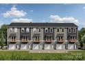 New townhome construction features individual garages and covered patios at 528 Beatties Ford Rd, Charlotte, NC 28216