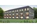 New townhome construction with well-manicured lawn features individual front doors at 528 Beatties Ford Rd, Charlotte, NC 28216