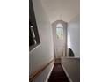 Bright foyer featuring vaulted ceilings, decorative lighting, and an arched window above the front door at 716 Coy Ct, Charlotte, NC 28216
