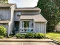 Charming two-story home with a cozy front porch and well-maintained landscaping at 100 Willow Run Dr # 26, Gastonia, NC 28056