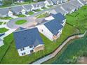 Aerial view of new home construction backing up to green space and landscaping at 2085 Bonds Ln # 26, Fort Mill, SC 29715