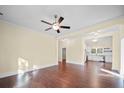 Bright, open-concept living area featuring hardwood floors and seamlessly flowing into the kitchen at 300 W 12Th St, Salisbury, NC 28144