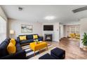 Comfortable living room with a cozy fireplace and stylish contemporary furnishings at 7205 Finnigan Rd, Charlotte, NC 28215