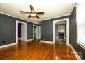 Spacious living room showcasing hardwood floors and access to multiple rooms at 2905 Grimes St, Charlotte, NC 28206