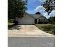 Charming one-story home featuring an attached garage and well-maintained front yard at 3012 Longspur Dr, Matthews, NC 28105