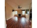 Bright living room with hardwood floors and fireplace, perfect for entertaining at 3012 Longspur Dr, Matthews, NC 28105