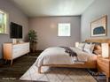 Staged bedroom with natural light, modern furniture, and neutral decor for a serene retreat at 345 Mountain View St, Gastonia, NC 28052