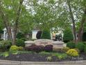 Stonegate Swim & Play community entrance with manicured landscaping and signage for a welcoming neighborhood feel at 6017 Lowergate Dr, Waxhaw, NC 28173