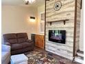 Cozy living area with stylish electric fireplace feature and comfortable seating at 625 Wildwood Dr, Rock Hill, SC 29730