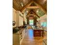 Spacious kitchen with a marble island, stainless steel appliances, and wood beam ceilings at 762 Highway 274 Hwy, Clover, SC 29710