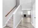 Bright living room with new flooring and a fireplace at 10606 Gallowgate Ln, Charlotte, NC 28213