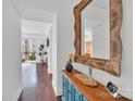 Charming entryway with hardwood floors and stylish decor at 1315 East Blvd # 410, Charlotte, NC 28203